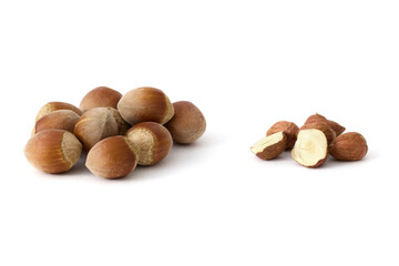 Whole hazelnuts scattered on a clean white background, showcasing their natural texture and rich...
