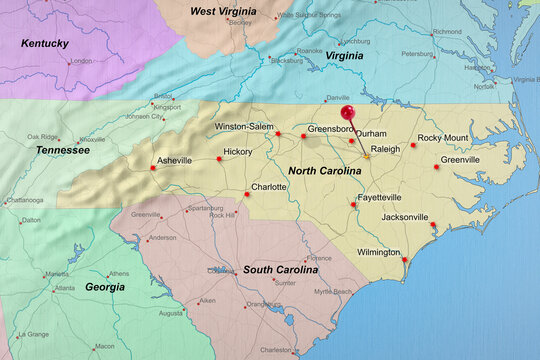 Colorful location map with red stick pin at Raleigh, North Carolina, United States of America, USA and the surrounding area