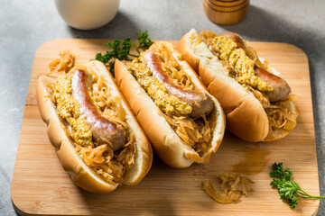 Homemade Beer Bratwursts on a Bun with Sauerkraut