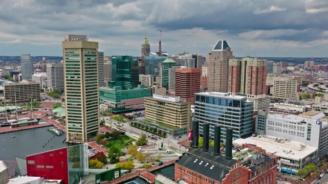Panoramic view of the baltimore cityscape under a cloudy sky