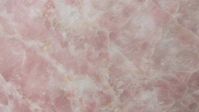 Texture de Quartz Rose D&eacute;licat aux Motifs Fluides pour Design d'Arri&egrave;re-Plan &Eacute;l&eacute;gant