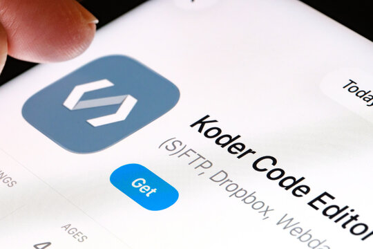 Koder code editor on iPad with Apples new Liquid Glass updated app design iOS 26 code editor listing in App Store. Stafford, United Kingdom, September 25, 2025.