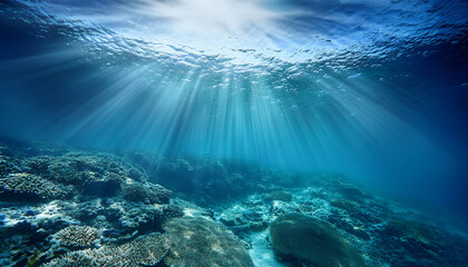 Fototapeta premium Serene Underwater Scene With Sunbeams Piercing The Deep Turquoise Water Rays Of Light Create A Calm And Tranquil Seascape With Ripples And Bubbles Beauty Of The Aquatic Environment