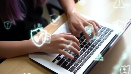 Cybersecurity expert works protectively on a laptop - Powered by Adobe