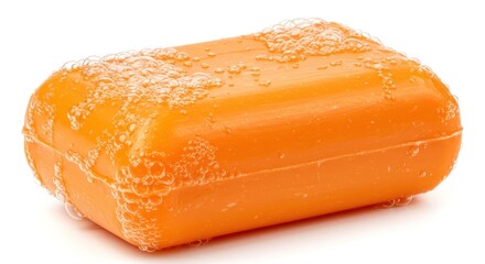 Bright orange bar of soap, covered in suds, isolated on white background.