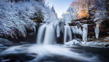Waterfall In Frosty Winter Landscape Long Exposure