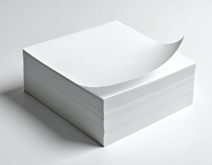 Stack of blank sticky notes with only the top one slightly peeled