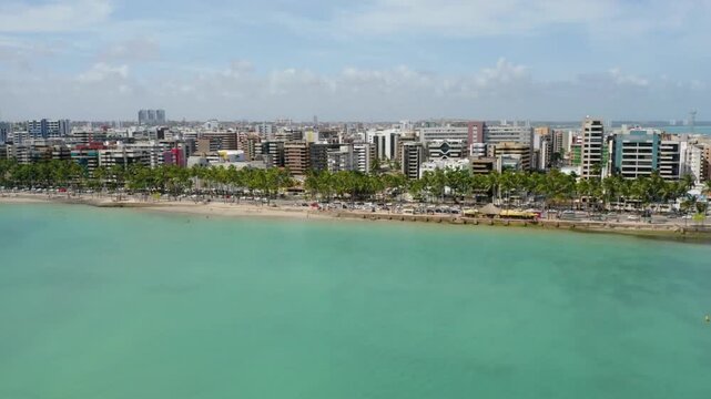 Aerial view of macei, brazil, featuring turquoise water and city skyline