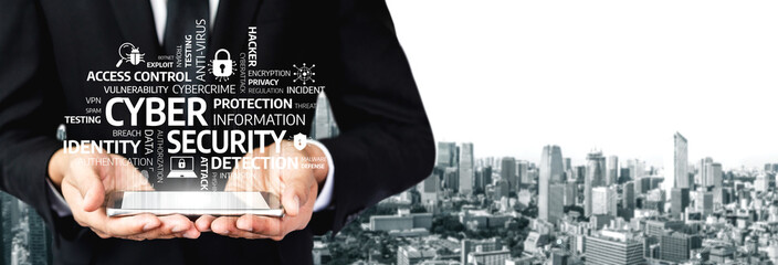 A businessman in a suit holds a tablet displaying icons related to cyber security amid a modern city backdrop, symbolizing the importance of information safety and protection. Tessel