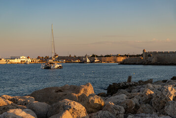 Fototapeta premium Rhodes City Catamaran at Sunset