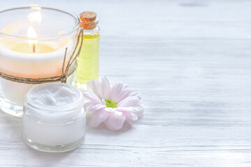 spa nail care with aroma candle on wooden background