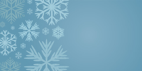Blue snowflake patterns on a blue background with space for text. Winter decorative element for Christmas. Abstract winter holiday background.