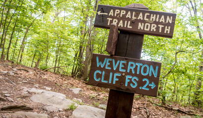 A sign directing hikers to Weverton Cliffs on the Appalachian Trail
