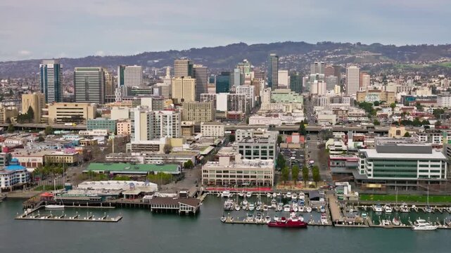 Aerial view of the oakland, california skyline and harbor on a cloudy day