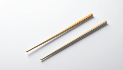 Minimalist Composition of Wooden Chopsticks Against a Clean White Backdrop