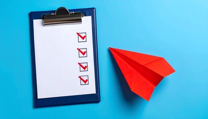 Checklist and paper airplane