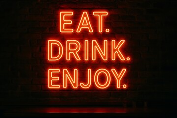 Bright orange neon sign displaying the words eat drink enjoy against a dark background