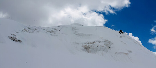 Tian Shan mountains snow peaks high resolution wide angle panoramic landscape. Huge glacier and...
