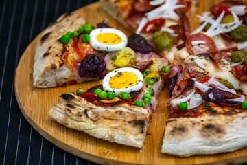 The most acclaimed, traditional and popular Brazilian pizza, half pepperoni calabresa and half Portuguese