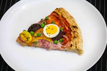 The most acclaimed, traditional and popular Brazilian pizza, half pepperoni calabresa and half Portuguese