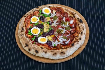 The most acclaimed, traditional and popular Brazilian pizza, half pepperoni calabresa and half Portuguese