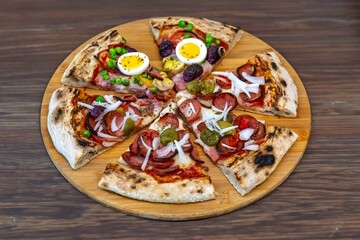 The most acclaimed, traditional and popular Brazilian pizza, half pepperoni calabresa and half Portuguese