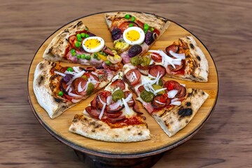 The most acclaimed, traditional and popular Brazilian pizza, half pepperoni calabresa and half Portuguese