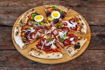 The most acclaimed, traditional and popular Brazilian pizza, half pepperoni calabresa and half Portuguese