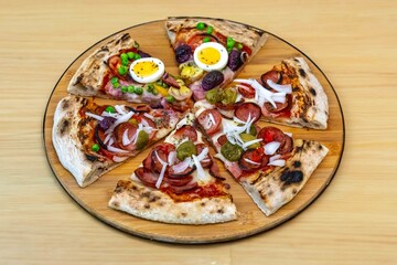 The most acclaimed, traditional and popular Brazilian pizza, half pepperoni calabresa and half Portuguese