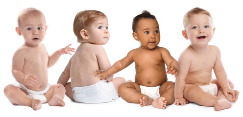 Adorable babies in diapers on white background
