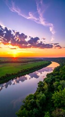 Serene sunset over a meandering river, reflecting vibrant colors