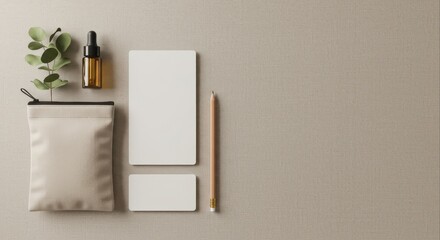 Fototapeta premium Minimalist flat lay of eco-friendly branding stationery and cosmetic items.
