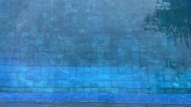 Abstract Texture of Turquoise Blue Swimming Pool Water Ripples