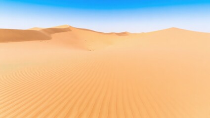Rippled sand dunes under a clear blue sky, vast desert landscape