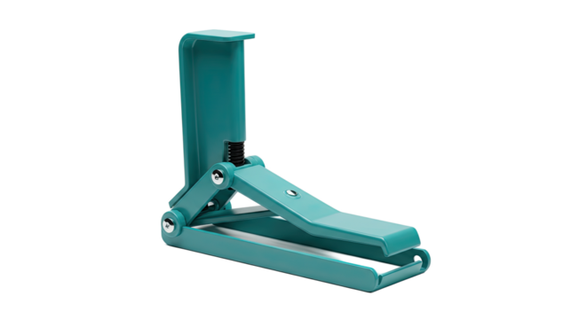 Green plastic foot pedal device for controlling equipment or machinery.