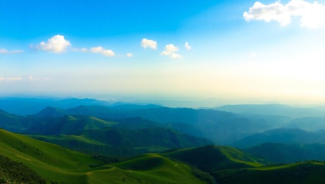 Vast mountain landscape under a bright blue sky with wispy clouds