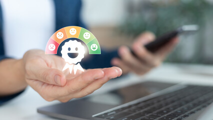Hand holding customer satisfaction icon with feedback rating scale, service review, happy face,...