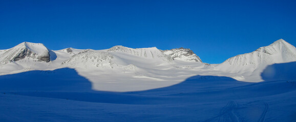 Winter day in the mountains of northern Sweden beyond polar circle  high resolution wide angle panoramic landscape. Sarek national park Abisko, Gallivare, Kvikkjokk Expedition beyond polar circle