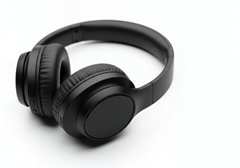 Black wireless headphones resting on a white surface, showcasing sleek modern audio technology for music enjoyment and communication.