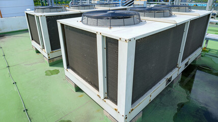 Large rooftop condenser HVAC unit for central cooling system in a big building,