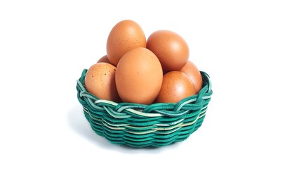 Front view Stack of fresh chicken egg in green basket wicker bamboo. Isolated on white background with copy space. Suitable for editing and used for food and nutrition advertising. Clipping path.