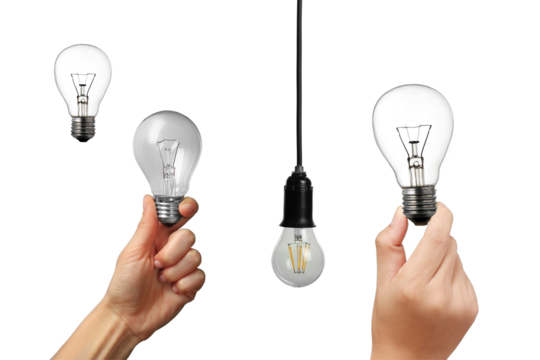 Different light bulbs displayed in various positions, including being held in hand and hanging from a cord, symbolizing ideas, innovation, and energy concepts. - Powered by Adobe