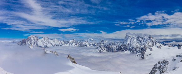 Mountain landscape of the Alps in Chamonix valley, France high resolution wide angle panoramic landscape. Alpine scenery in summer sunny weather on Tour du Mont Blanc, TMB trekking route