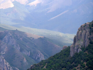 Naklejka premium mountains in the mountains. landscape, mountains, mountain, nature, view, sky, valley, green, forest, cloud, rock, hill, trees, canyon, summer, travel, clouds, panorama, high, europe, scenic, stone, r