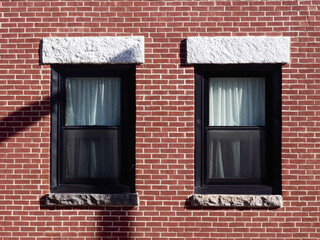 A breathtaking city view through the river, where the skyline reflects on calm waters and the urban lights blend with nature’s serenity. This scene captures the harmony between city life and natural