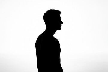 Minimal male silhouette with subtle rim light standing against pure white background representing anonymity privacy and universal human form in modern studio