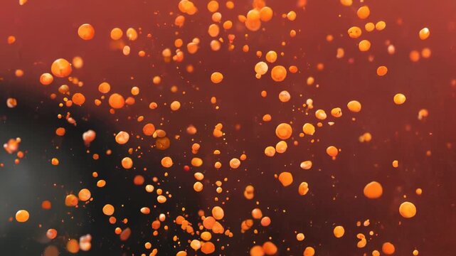araffes of orange bubbles floating in the air