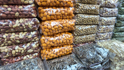 Colorful assortment of nuts and snacks in a market