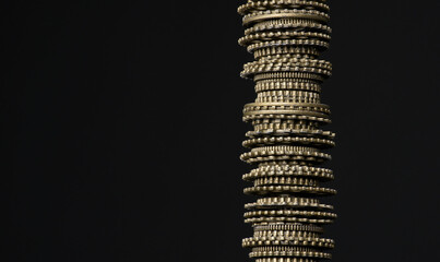 Small bronze cogs arranged on top of each other textures and patterns in engineering metal work
