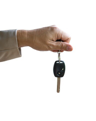 Man holding a car key, isolated on transparent background.